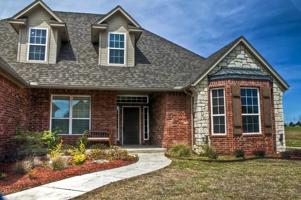 Completed Tomes Roofing and Contracting residential exterior project